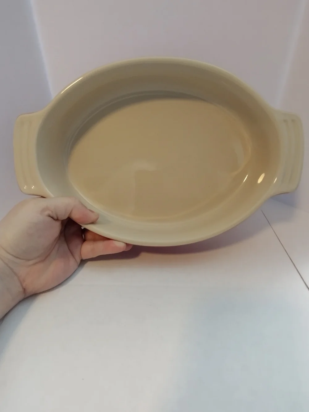 Le Creuset Red Ceramic Oval Baking Dish with Cream Interior